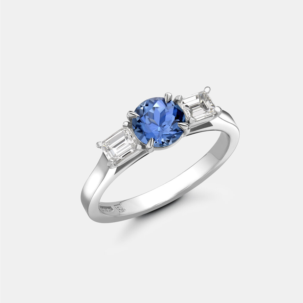The Oval Blue Sapphire and Diamond Millgrain Scroll Ring