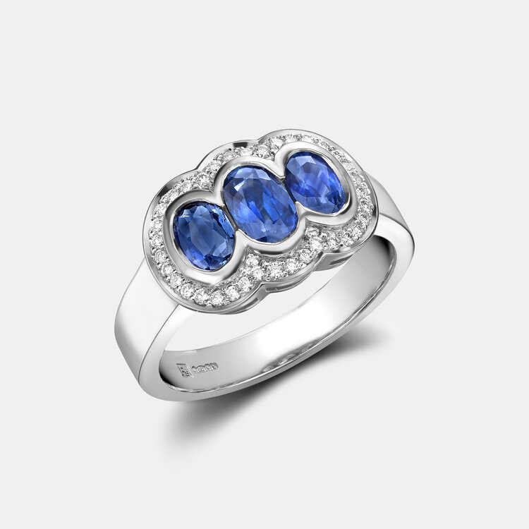 Bespoke Sapphire Trilogy Ring with Diamond Halo in Platinum